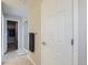 Bathroom showcasing the tile floor, walk-in shower, walk-in closet and neutral color palette at 6492 N Ceylon St, Denver, CO 80249