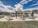 Outdoor community grill area with picnic tables and plenty of seating for gatherings at 6492 N Ceylon St, Denver, CO 80249