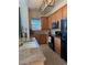 Contemporary kitchen featuring granite countertops, modern appliances, and ample cabinet space at 15455 Canyon Rim Dr # 307, Englewood, CO 80112