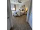 Comfortable bedroom with natural light, plush carpet, and neutral decor at 15455 Canyon Rim Dr # 307, Englewood, CO 80112