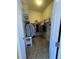 Spacious walk-in closet with ample shelving and hanging space at 15455 Canyon Rim Dr # 307, Englewood, CO 80112