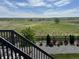 Beautiful backyard featuring lawn, rock garden, fence and natural open space beyond the property line at 13432 Broad Wing Dr, Parker, CO 80134
