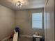 Bright and playful bedroom featuring carpeted floors, a large window, and toys at 13432 Broad Wing Dr, Parker, CO 80134