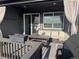 Inviting covered deck with comfortable seating, outdoor table, and neutral decor at 13432 Broad Wing Dr, Parker, CO 80134