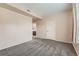 Bedroom view featuring soft carpeting, natural light and access to a bathroom at 2985 Blue Sky Cir # 7-107, Erie, CO 80516