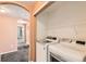 Convenient laundry area with modern washer and dryer hookups and useful shelving at 2985 Blue Sky Cir # 7-107, Erie, CO 80516