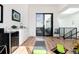 An open concept bonus room with a wet bar and sliding door access to the outdoor patio at 4243 E 8Th Ave, Denver, CO 80220