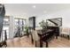 Bright dining room features a wood table with bench seating and a staircase at 4243 E 8Th Ave, Denver, CO 80220