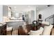 Open kitchen with stainless steel appliances and marble countertops at 4243 E 8Th Ave, Denver, CO 80220