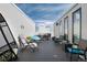 Roof deck featuring multiple seating areas with views of the city at 4243 E 8Th Ave, Denver, CO 80220