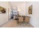 Open-concept dining area with stylish table setup and modern kitchen backdrop at 595 Manhattan Dr # 203, Boulder, CO 80303