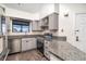 Charming kitchen with stainless steel appliances, granite counters, and ample cabinet space at 595 Manhattan Dr # 203, Boulder, CO 80303