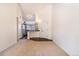 Bright living room showcases open floor plan with modern kitchen, blending style and function at 595 Manhattan Dr # 203, Boulder, CO 80303