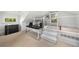 Upstairs bonus room with tiered platform and studio equipment at 3109 E Warren Ave, Denver, CO 80210