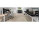 Large, flexible bonus room with recording equipment and tiered platform at 3109 E Warren Ave, Denver, CO 80210