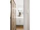 Well-lit half bathroom with modern fixtures and a sleek vanity at 11041 Richfield Cir, Commerce City, CO 80022