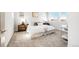 Bright bedroom featuring white walls, plush carpet, and natural light from two windows at 11041 Richfield Cir, Commerce City, CO 80022