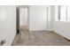 Carpeted bedroom with closet and light coming in from the side window at 11041 Richfield Cir, Commerce City, CO 80022