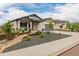 Attractive single-Gathering home featuring a well-kept lawn, rock drainage and inviting curb appeal at 4465 Mesa Top Dr, Monument, CO 80132