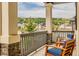 Relaxing front porch area with comfortable seating and scenic neighborhood views at 4465 Mesa Top Dr, Monument, CO 80132