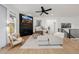 Contemporary living room with a stylish fireplace, comfortable seating, and bright, airy atmosphere at 4465 Mesa Top Dr, Monument, CO 80132