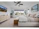 This spacious main bedroom features a large window, modern decor, and a comfortable layout at 4465 Mesa Top Dr, Monument, CO 80132