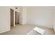 Bright bedroom featuring neutral carpet, fresh paint, and a walk-in closet at 8500 E Jefferson # 3C, Denver, CO 80237