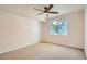 Bedroom featuring natural light, a ceiling fan, and neutral carpeting at 8500 E Jefferson # 3C, Denver, CO 80237