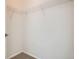 Walk-in closet featuring wire shelving with a neutral color carpet at 8500 E Jefferson # 3C, Denver, CO 80237