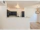 Modern kitchen with stainless steel appliances, dark cabinetry and an open concept design at 8500 E Jefferson # 3C, Denver, CO 80237