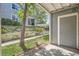 A view from the covered patio, showcasing the landscaped surroundings at 8500 E Jefferson # 3C, Denver, CO 80237