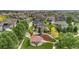 Aerial view showcasing neighborhood homes overlooking a park with a covered picnic area and playground at 13673 Osage St, Broomfield, CO 80023