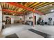 Unfinished basement area offering versatile space for various activities with exposed ceiling at 13673 Osage St, Broomfield, CO 80023