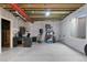 Unfinished basement area, offering versatile space for various activities with exposed ceiling and small window at 13673 Osage St, Broomfield, CO 80023