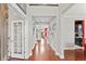 Spacious foyer with hardwood floors, high ceilings, and elegant decor throughout at 13673 Osage St, Broomfield, CO 80023