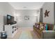 Cozy living area with television, sofa and comfortable seating at 13673 Osage St, Broomfield, CO 80023