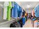 Spacious walk-in closet with organized shelving and hanging rods at 13673 Osage St, Broomfield, CO 80023