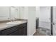 Small bathroom with vanity and tiled floor at 26774 E Archer Ave, Aurora, CO 80018