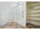 Bathroom with shower and linen closet at 26774 E Archer Ave, Aurora, CO 80018