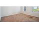 Simple bedroom with neutral carpeting at 26774 E Archer Ave, Aurora, CO 80018