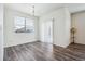 Bright dining area with hardwood floors and window blinds at 26774 E Archer Ave, Aurora, CO 80018