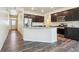 Modern kitchen with stainless steel appliances and granite counters at 26774 E Archer Ave, Aurora, CO 80018
