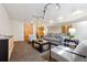 Finished basement offering space for comfortable seating, movie nights, and entertaining guests at 11796 W 53Rd Pl, Arvada, CO 80002