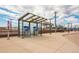 Modern light rail station with covered platforms, ticket vending machines, and easy access for commuters at 11796 W 53Rd Pl, Arvada, CO 80002