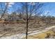Enjoyable backyard view overlooking a walking path and other homes, creating a pleasant outdoor atmosphere at 7696 S Monaco E Cir, Centennial, CO 80112