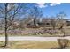 Scenic view of the backyard and neighboring homes with a walking path, perfect for enjoying nature at 7696 S Monaco E Cir, Centennial, CO 80112