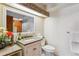 Bright bathroom with granite countertops, a mosaic backsplash, and ample space around the toilet at 7696 S Monaco E Cir, Centennial, CO 80112