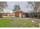 Backyard with garage and covered area at 2866 Bellaire St, Denver, CO 80207
