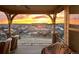 Gorgeous balcony view overlooking the neighborhood with a striking sunrise at 10662 Skydance Dr, Highlands Ranch, CO 80126