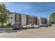Building exterior showcasing assigned parking, well-maintained grounds, and private balconies at 8635 Clay St # 417, Westminster, CO 80031